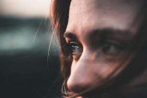 Eyes of a woman, gazing, unsure of herself